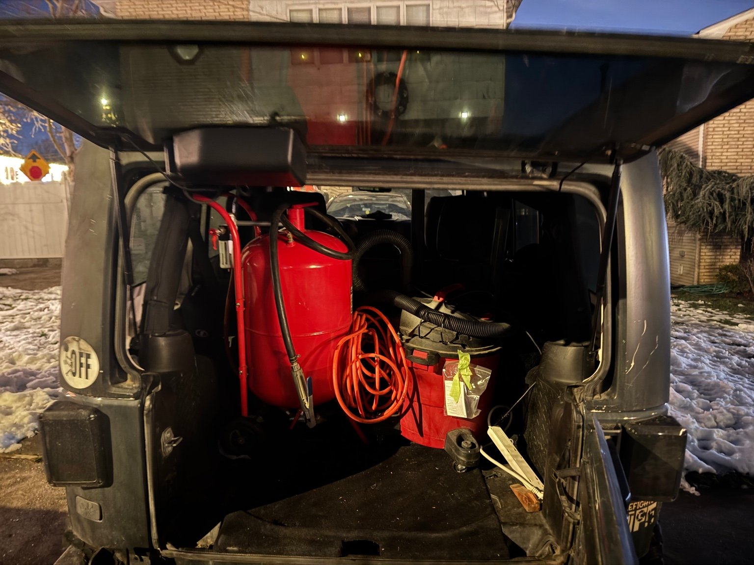 Equipment loaded in Jeep (night)