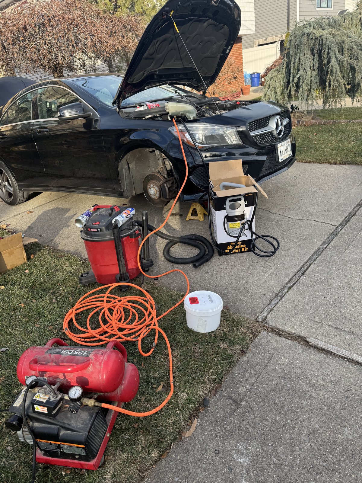 Job site setup (Mercedes + tools)